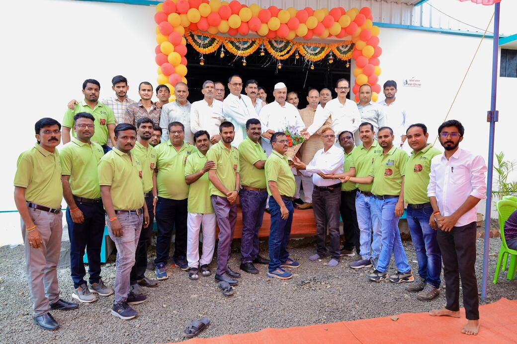 People standing in front of Warehouse.